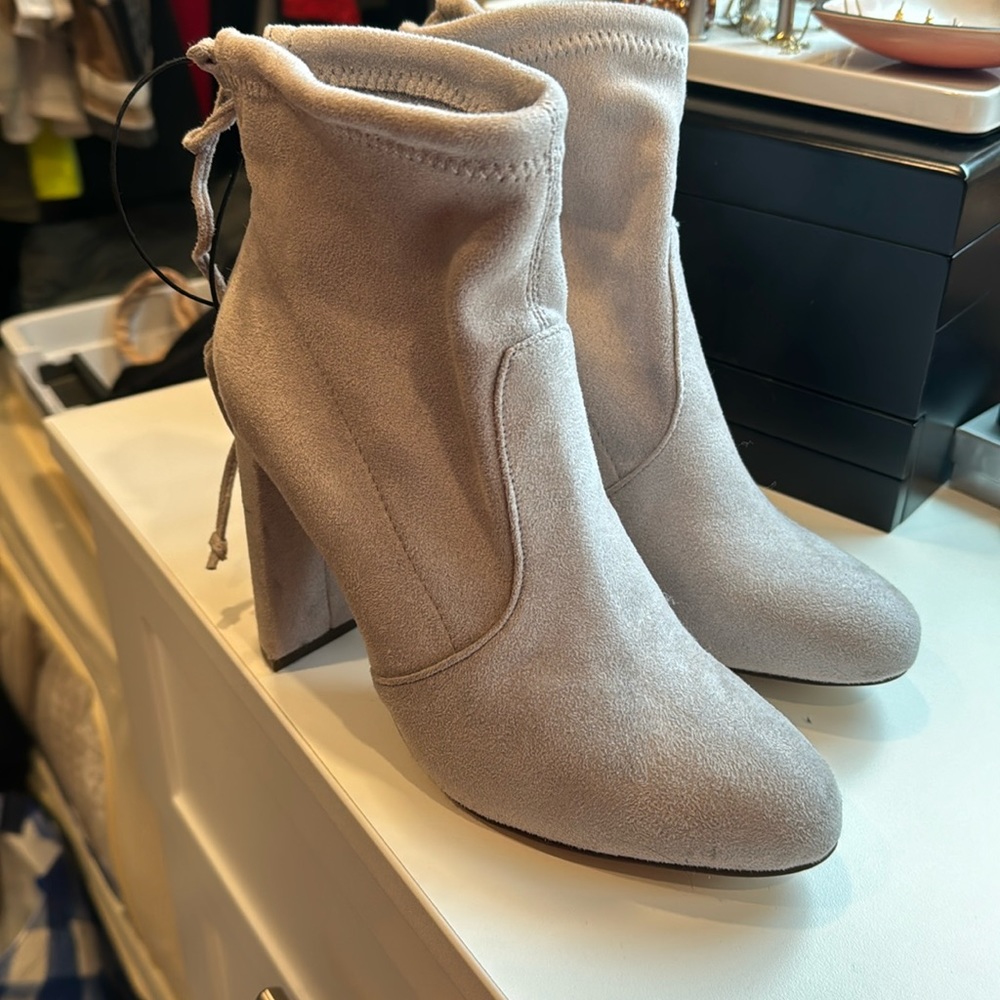 Never worn . BRAND NEW . Gray ankle boots